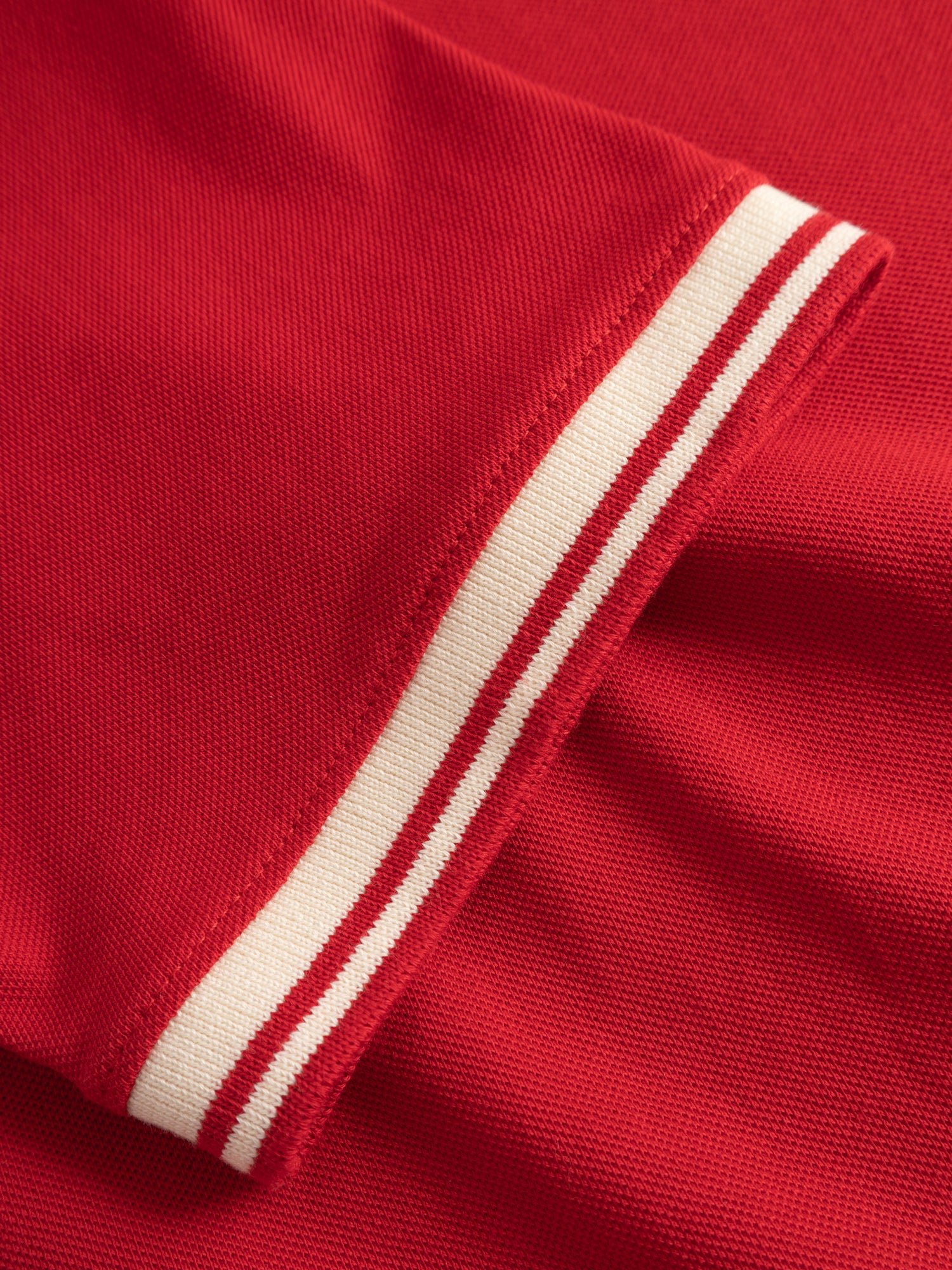 POLO ROUGE BLANC BLASON